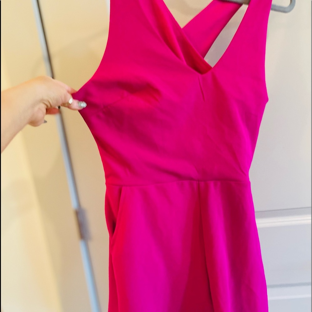 Sexy pink Romper with cross-cross back - never worn